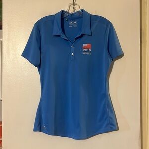Adidas blue short sleeve wicking polo shirt. Oakland Hills 2016 US Amateur logo